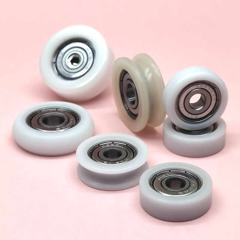 How do POM-coated rubber wheels compare to other materials?