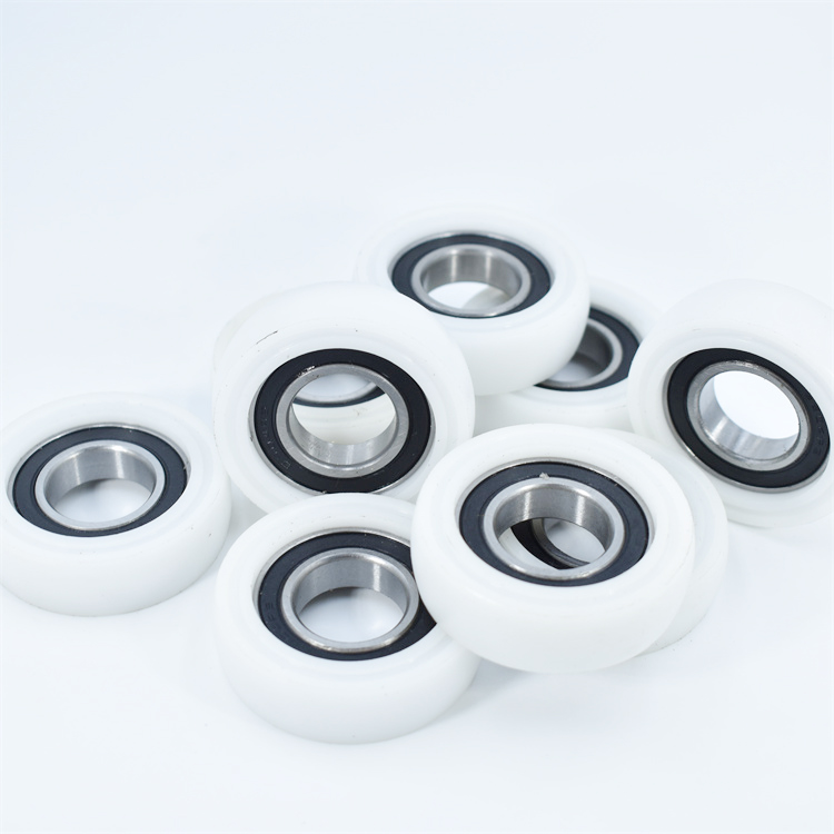 BSR690340-10 17x40x10mm Polyformaldeh Coated Round Roller 40mm Diameter 10mm Bore POM Track Guide Wheel Plastic Bearing.jpg